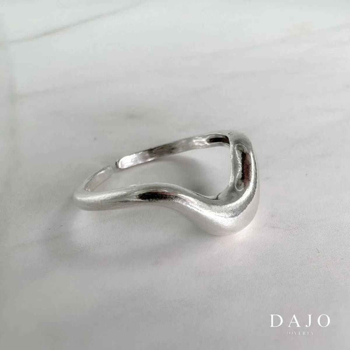 Joyería Anillo de plata .925 estilo liquido elegante diseño ajustable artesanal mexicano con forma de liquido se derrite