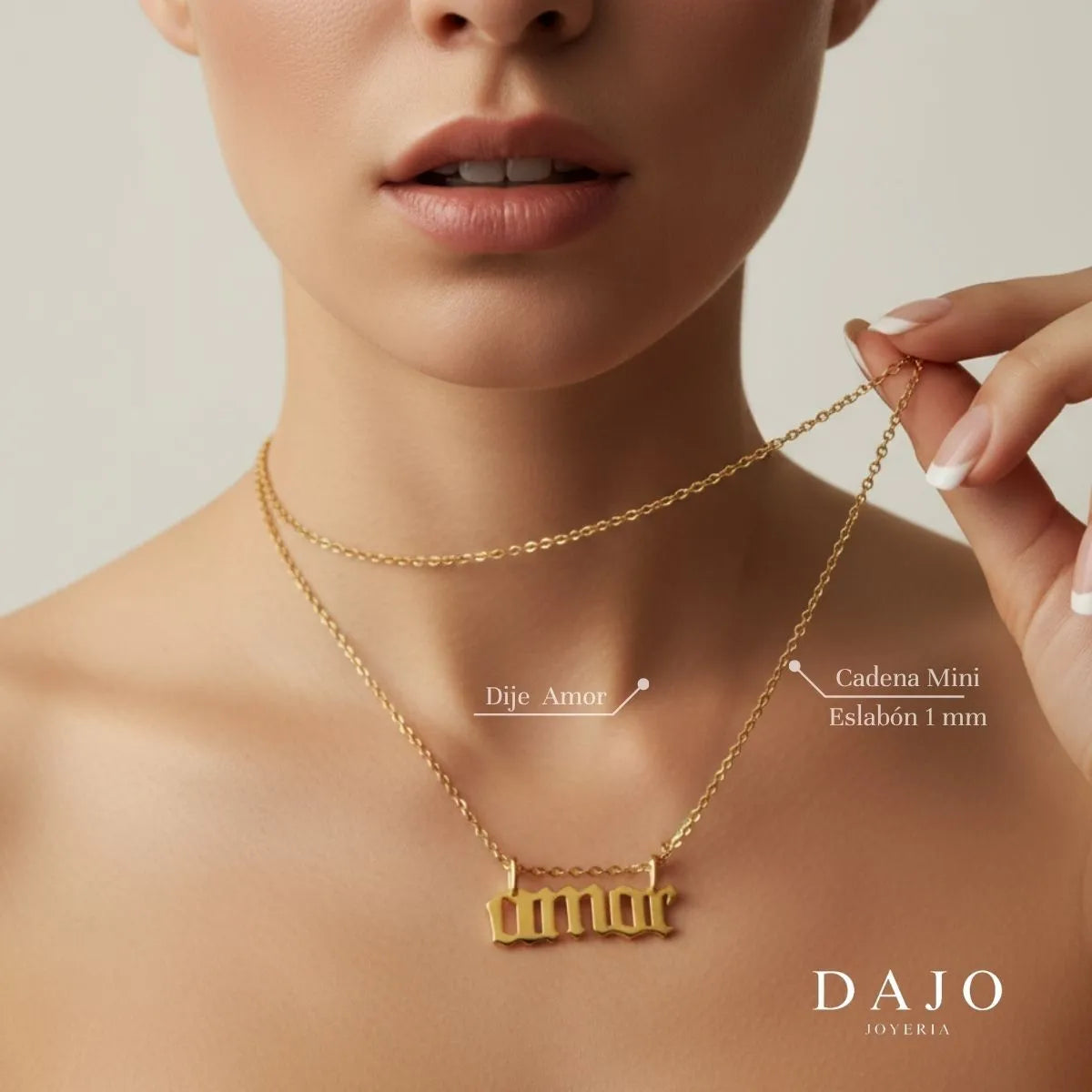 Dije Amor de oro sólido de DAJO colgando de una cadena