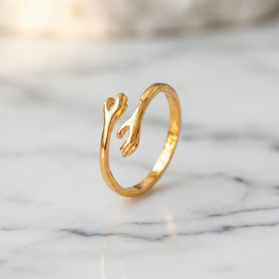 Anillo Abrazo en oro sólido 10k